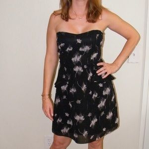 Strapless black dress.